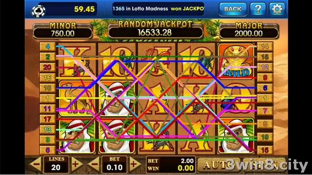 Desert Treasure reels against a sunlit sand dune backdrop